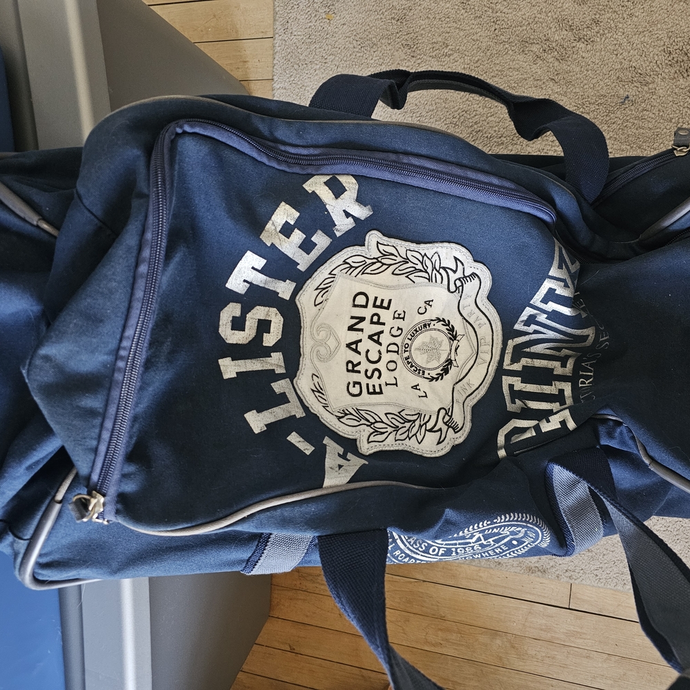 RSVP Vintage Victoria Secret Rolling Duffle